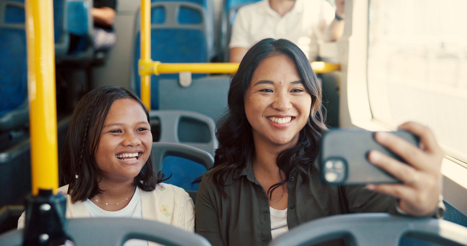 Corporate employees boarding an employee shuttle bus in downtown Toronto